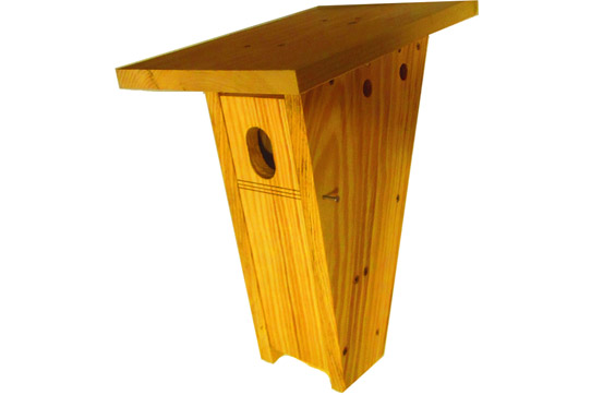 Peterson Bluebird Birdhouse with a large roof overhang and ventilation holes to keep the birdhouse from getting too warm in the summer months